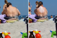 Kakva carica! Žena na plaži u Grčkoj smislila genijalan način kako da sama sebi namaže leđa i sada joj svi moleri zavide (VIDEO)